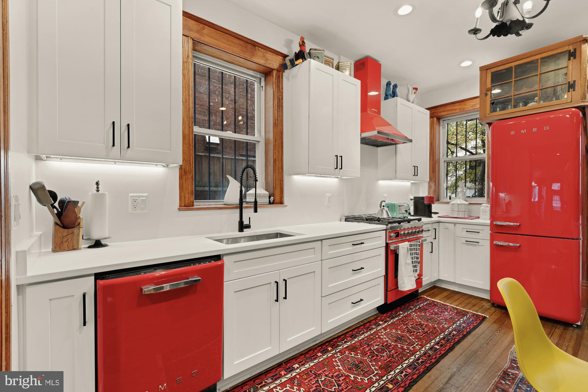 543 11th Street Southeast Washington, DC 20003 - Photo 14 of 41 a kitchen with stainless steel appliances granite countertop a sink and cabinets