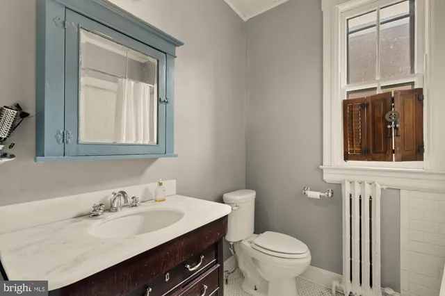 a bathroom with a shower and a tub
