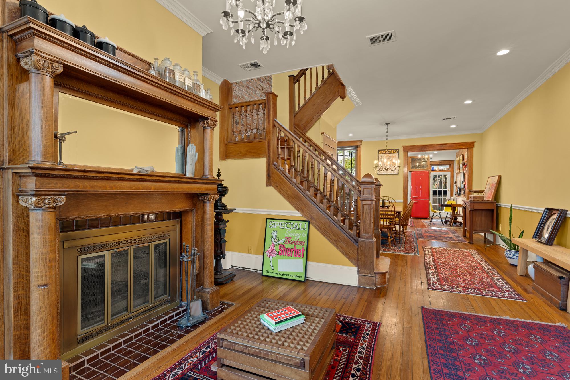 543 11th Street Southeast Washington, DC 20003 - Photo 3 of 41 a living room with fireplace furniture and a rug