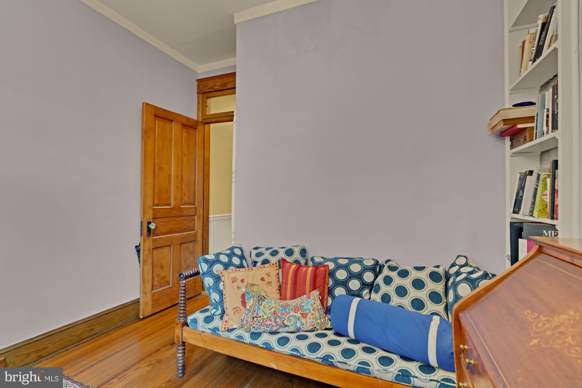 543 11th Street Southeast Washington, DC 20003 - Photo 33 of 41 a bedroom with a bed and wooden floor