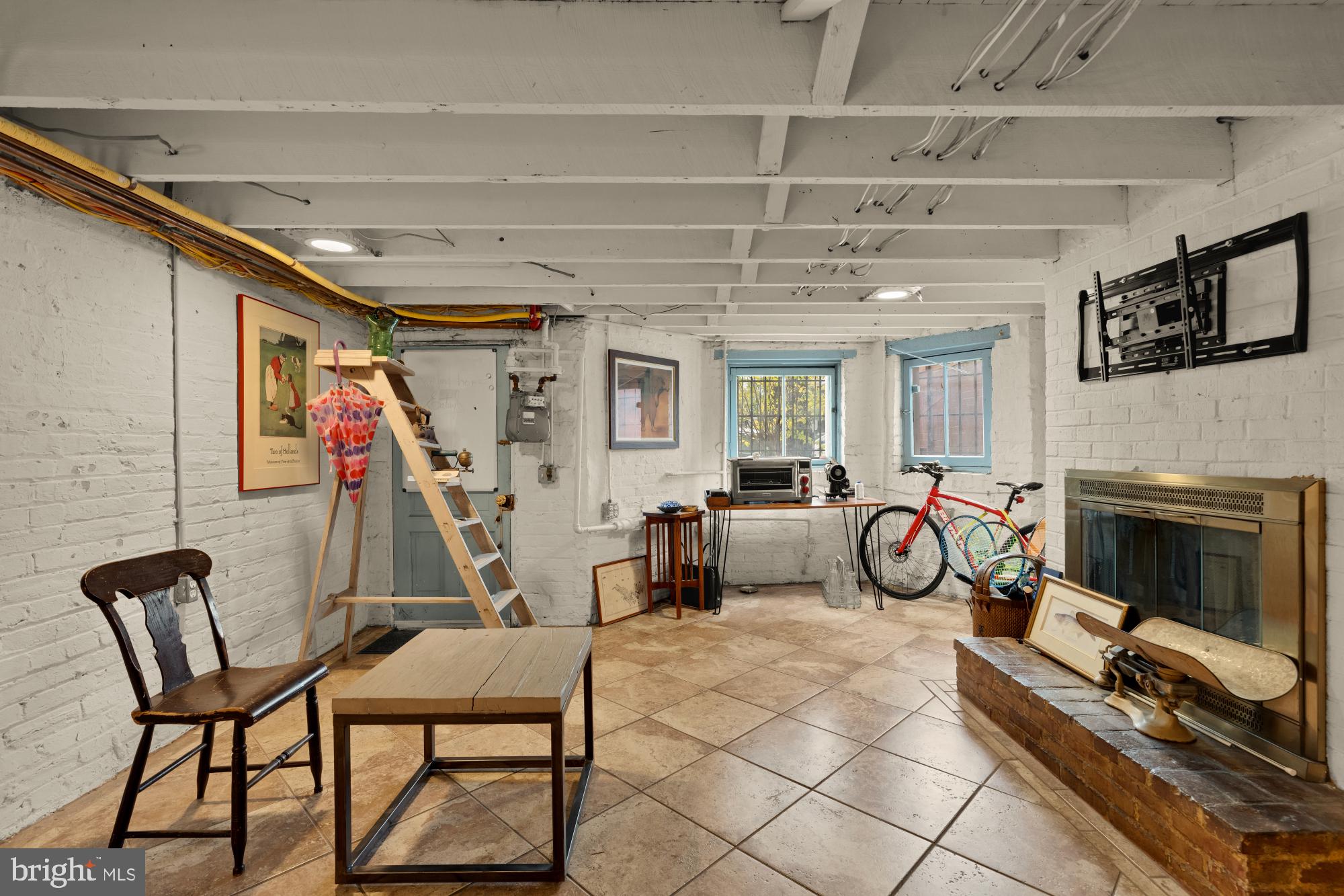 543 11th Street Southeast Washington, DC 20003 - Photo 37 of 41 a view of a livingroom with furniture and a fireplace
