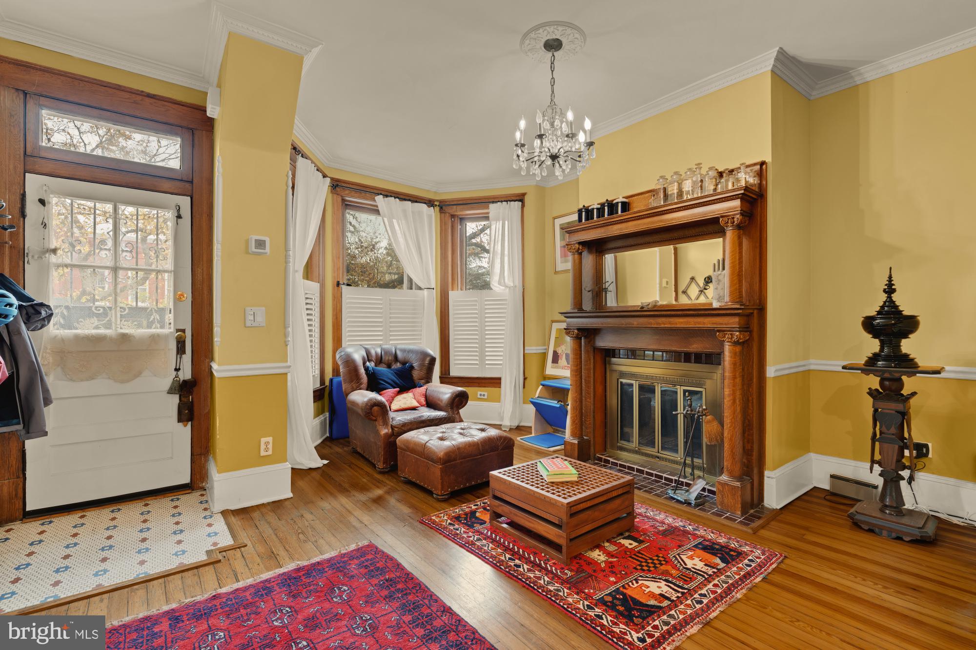 543 11th Street Southeast Washington, DC 20003 - Photo 5 of 41 a living room with furniture and a fireplace