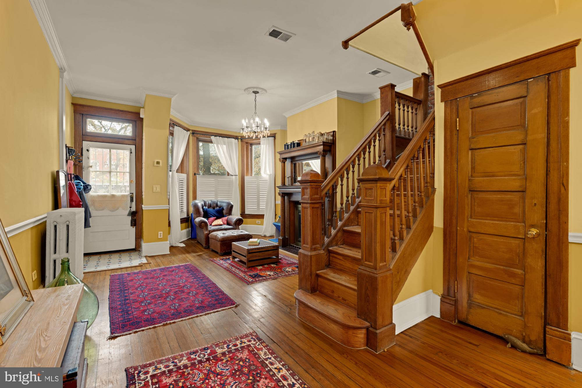 543 11th Street Southeast Washington, DC 20003 - Photo 9 of 41 a living room with lots of furniture and a wooden floor