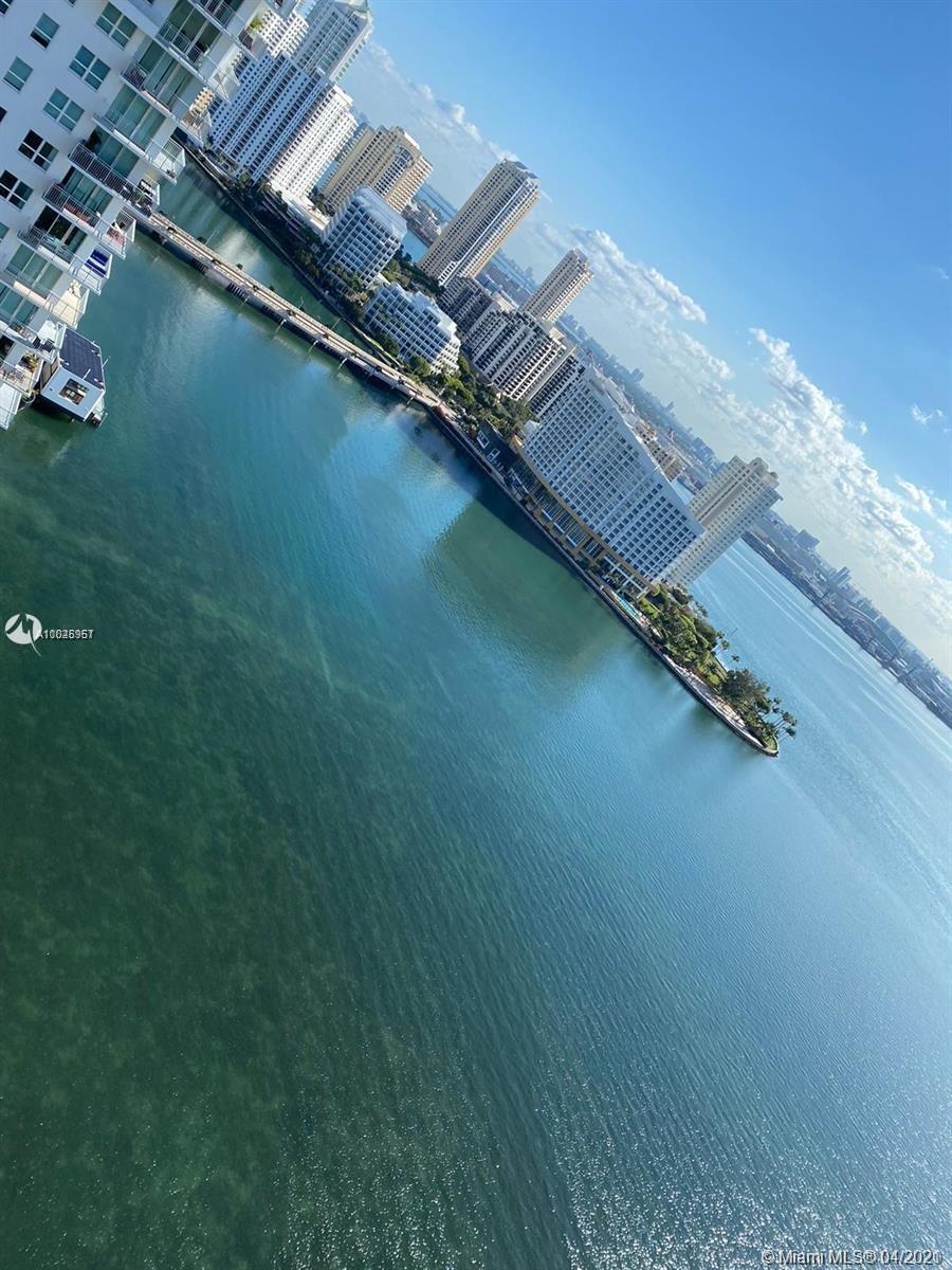 1155 Brickell Bay Drive, Unit 3008 Miami, FL 33131 - Photo 1 of 21 an aerial view of a house with a yard