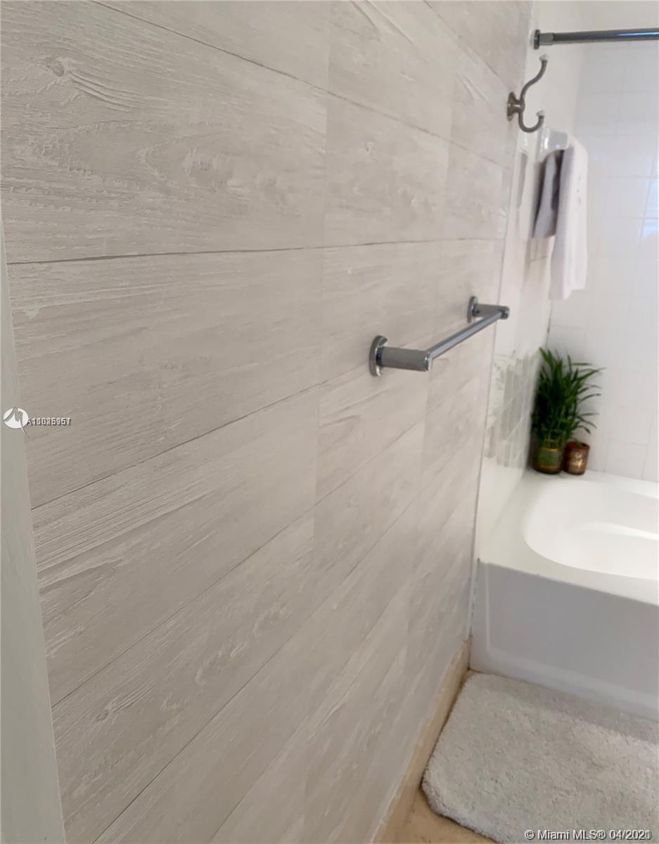 1155 Brickell Bay Drive, Unit 3008 Miami, FL 33131 - Photo 8 of 21 a bathroom with a shower