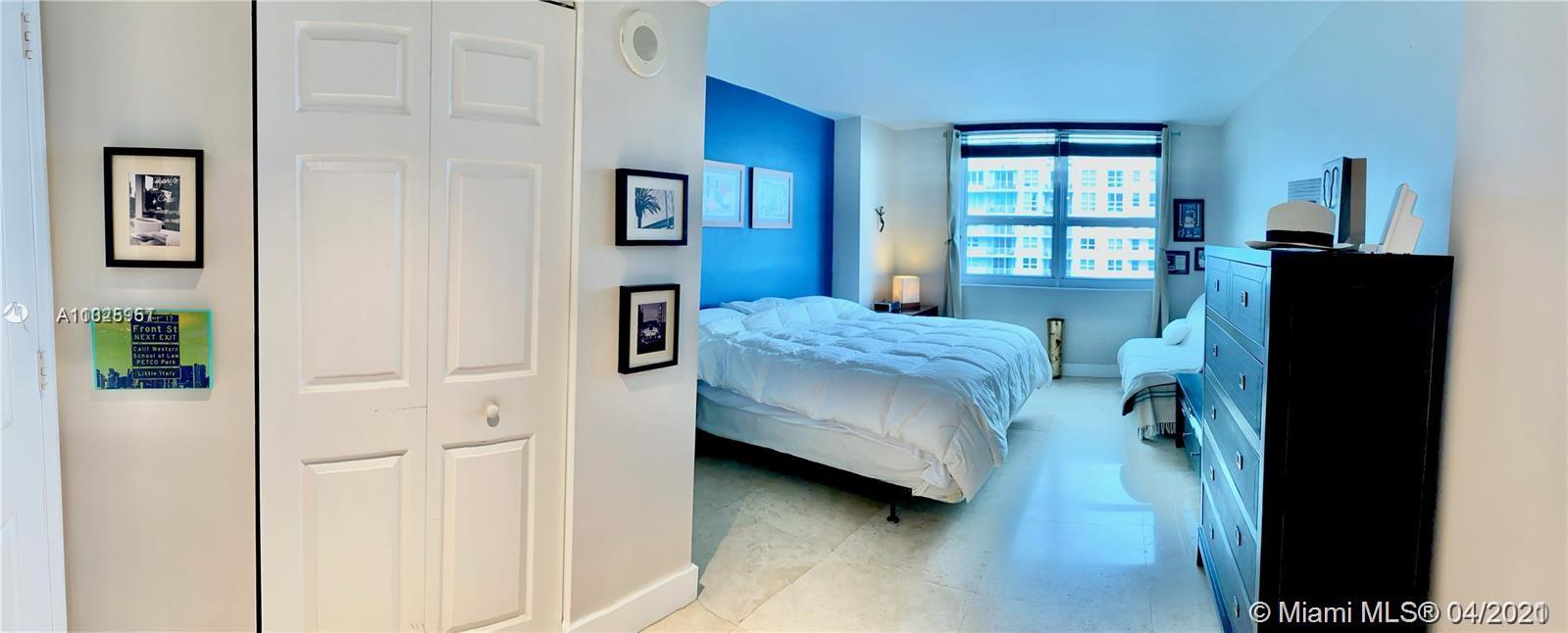 1155 Brickell Bay Drive, Unit 3008 Miami, FL 33131 - Photo 9 of 21 a bedroom with a bed and a window