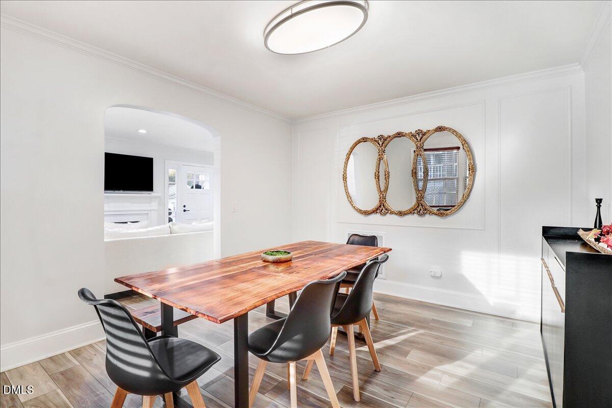 313 South 4th Street Smithfield, NC 27577 - Photo 9 of 31 a view of a dining room with furniture and a mirror