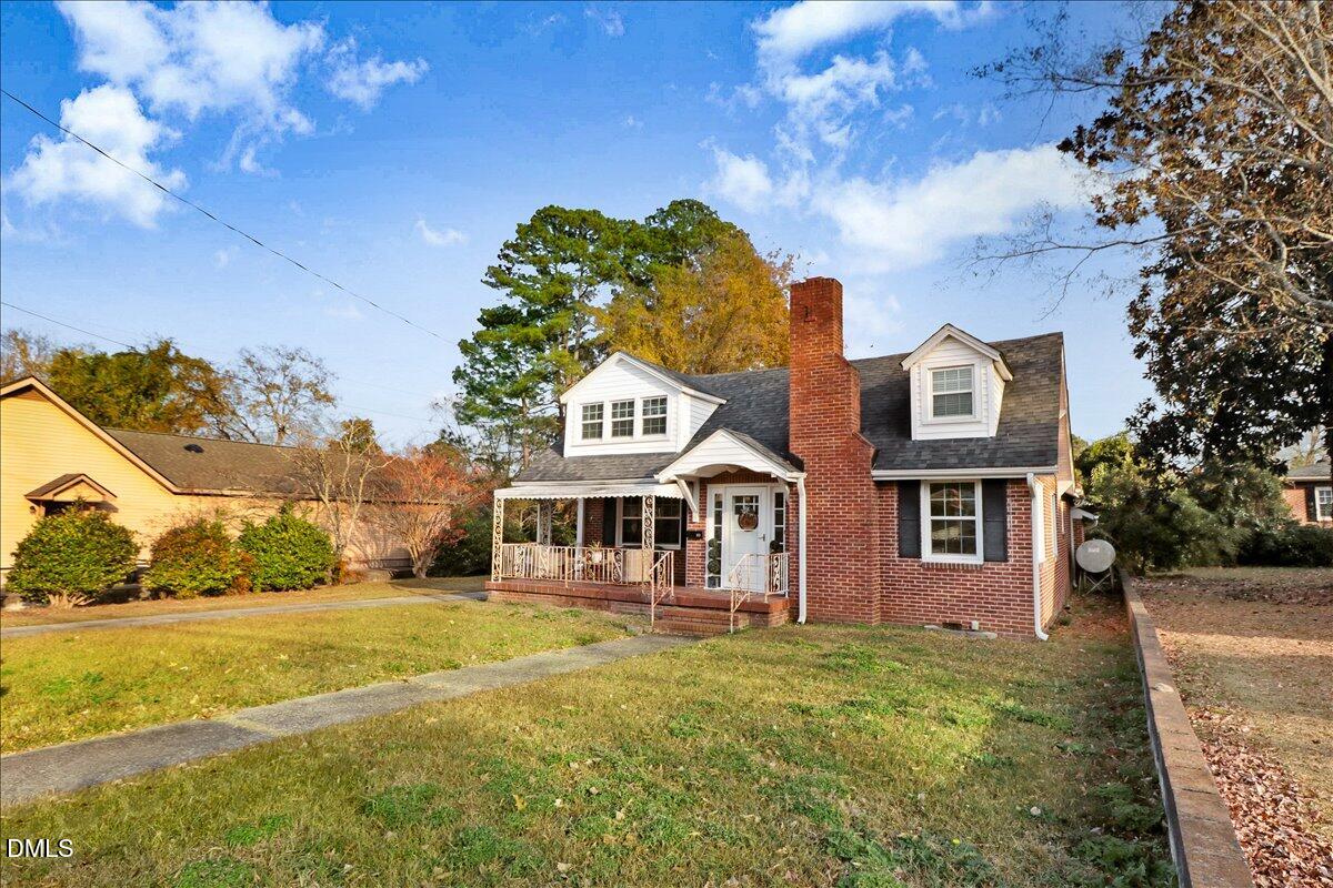 313 South 4th Street Smithfield, NC 27577 - Photo 2 of 31 a view of a house with a swimming pool