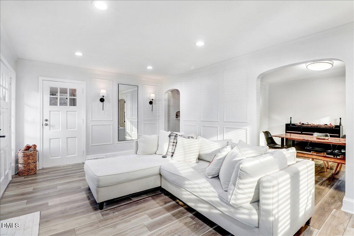 313 South 4th Street Smithfield, NC 27577 - Photo 6 of 31 a bedroom with a bed and wooden floor