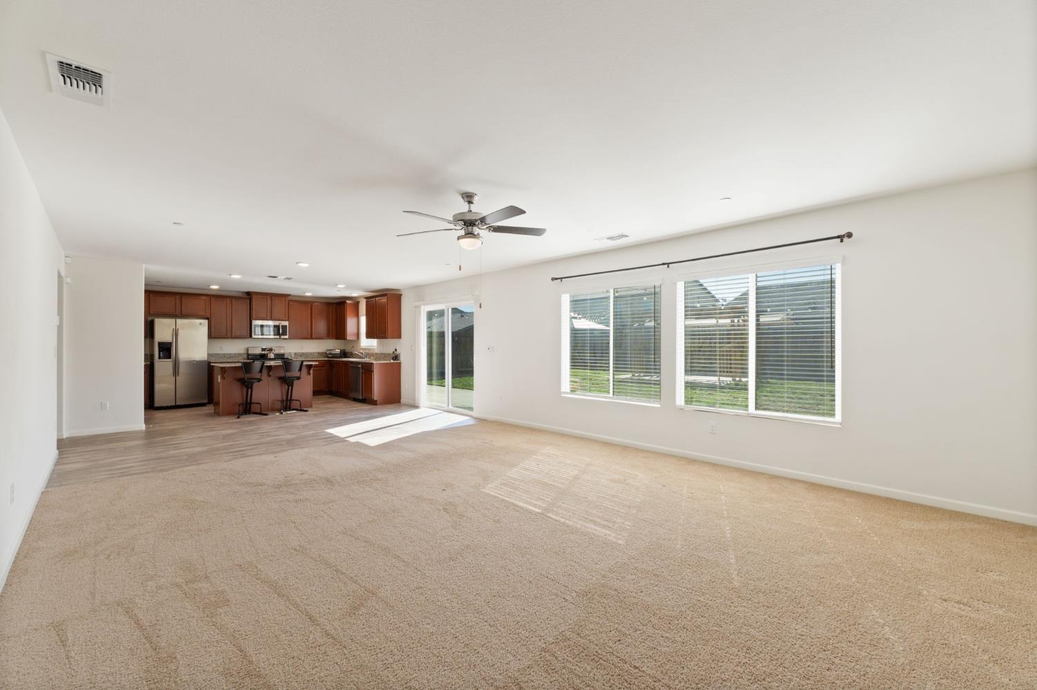 802 Riesling Lane Coalinga, CA 93210 - Photo 11 of 68 a view of a livingroom with furniture and windows