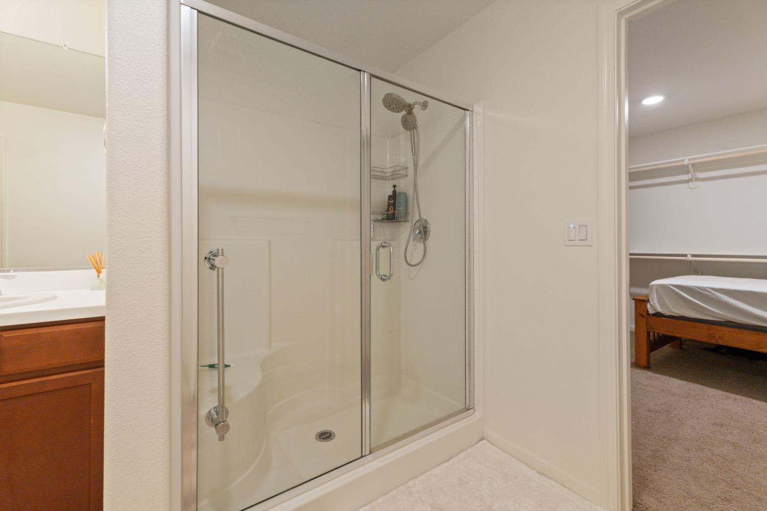 802 Riesling Lane Coalinga, CA 93210 - Photo 38 of 68 a bathroom with a shower and a sink