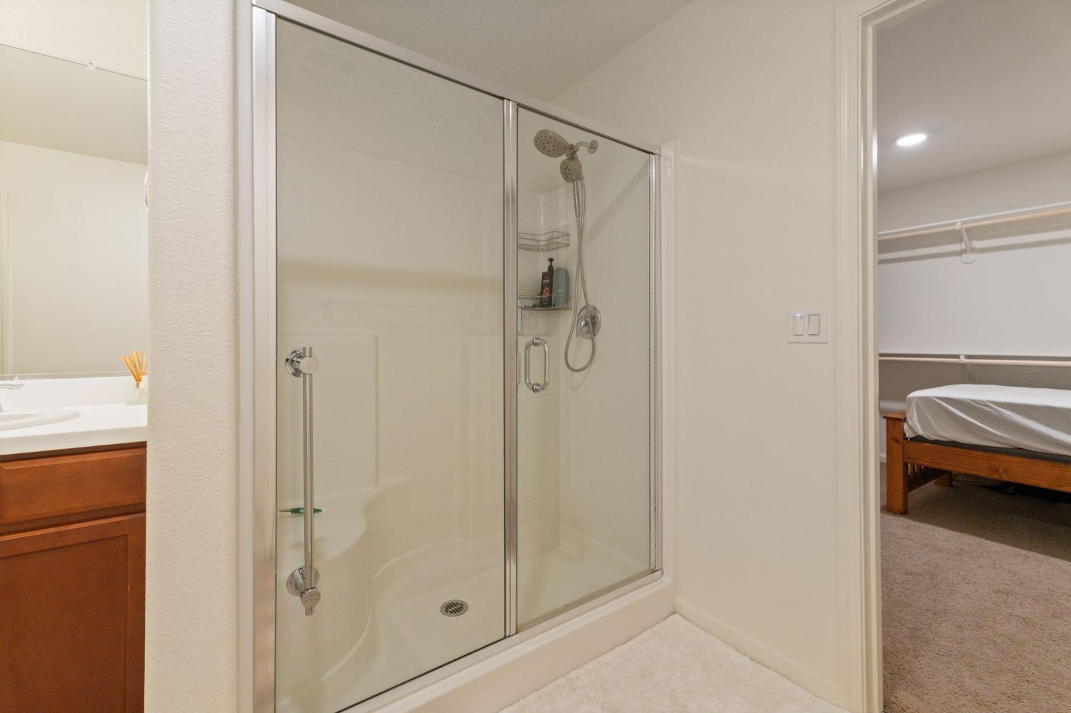 802 Riesling Lane Coalinga, CA 93210 - Photo 39 of 68 a bathroom with a shower and a sink