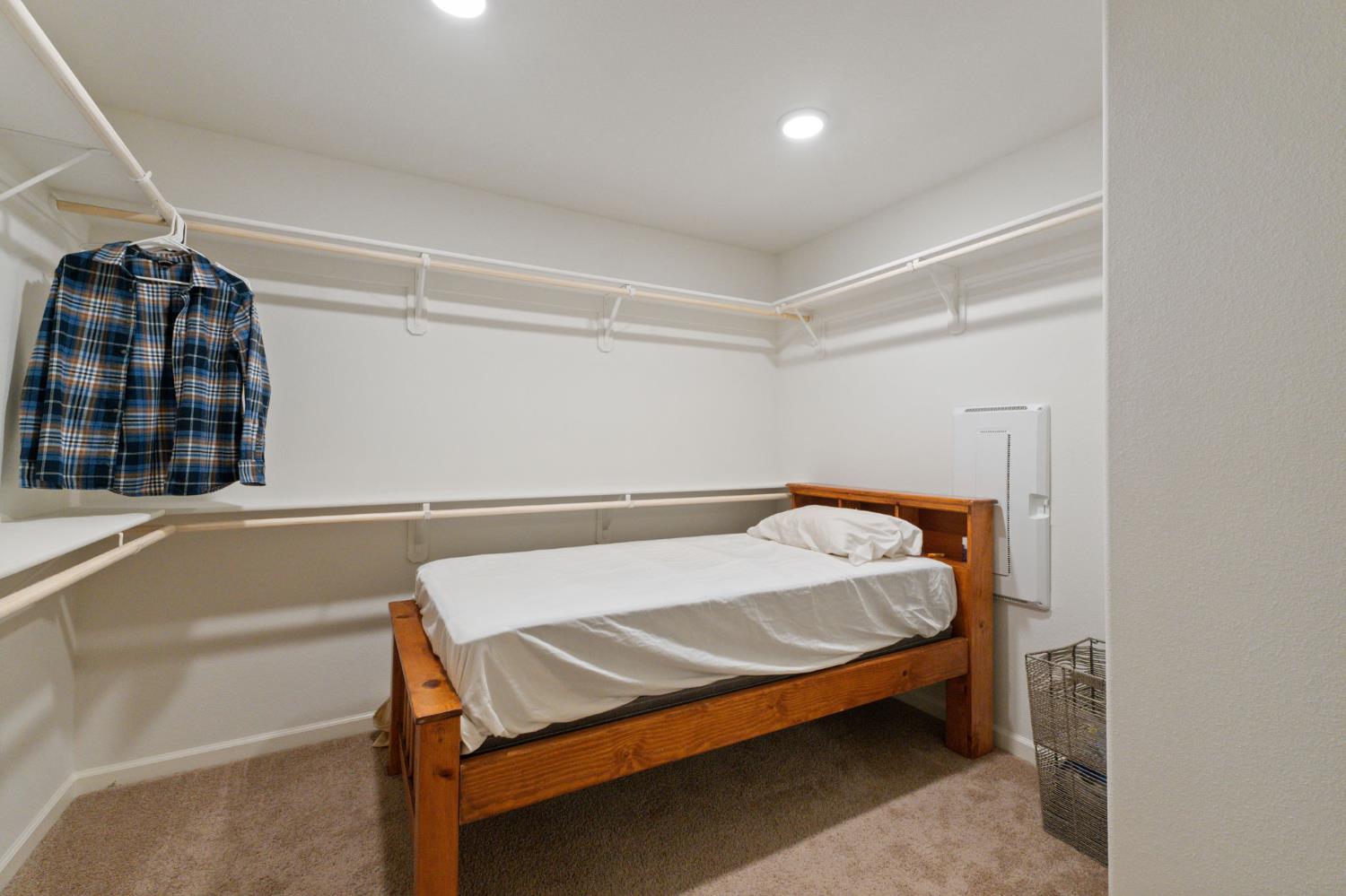 802 Riesling Lane Coalinga, CA 93210 - Photo 41 of 68 a bed sitting in a room next to a window