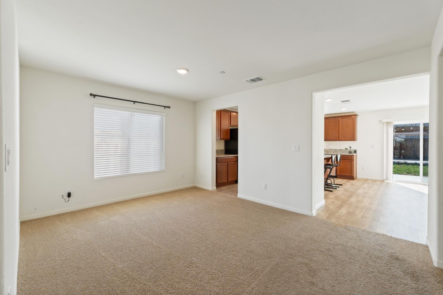 802 Riesling Lane Coalinga, CA 93210 - Photo 52 of 68 an empty room with windows