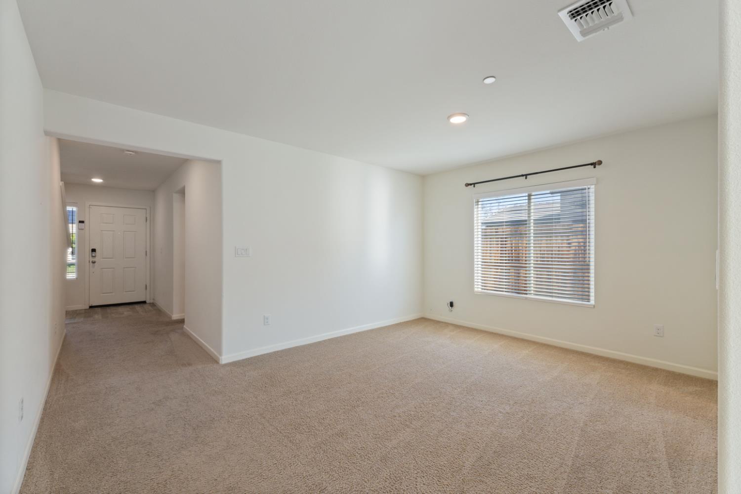 802 Riesling Lane Coalinga, CA 93210 - Photo 56 of 68 a view of an empty room with a window