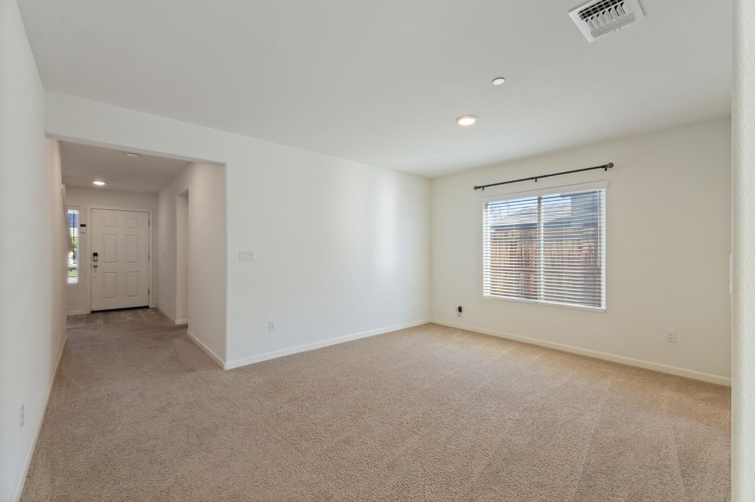 802 Riesling Lane Coalinga, CA 93210 - Photo 57 of 68 a view of an empty room with a window
