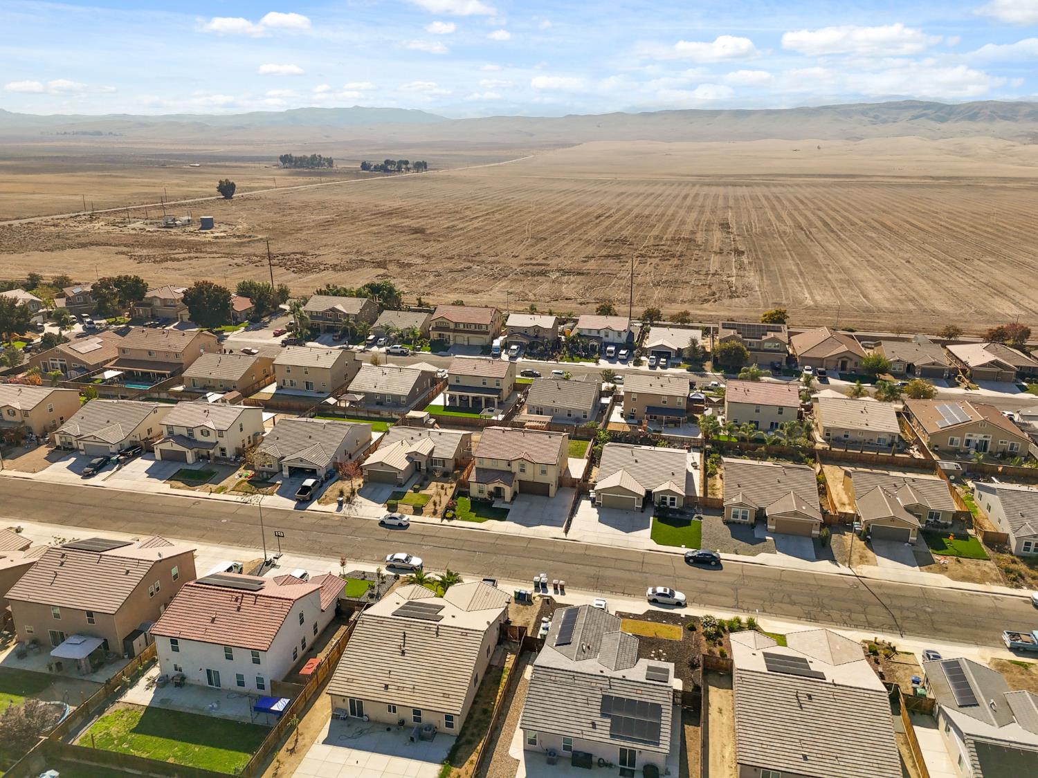 802 Riesling Lane Coalinga, CA 93210 - Photo 66 of 68 an aerial view of residential building and ocean