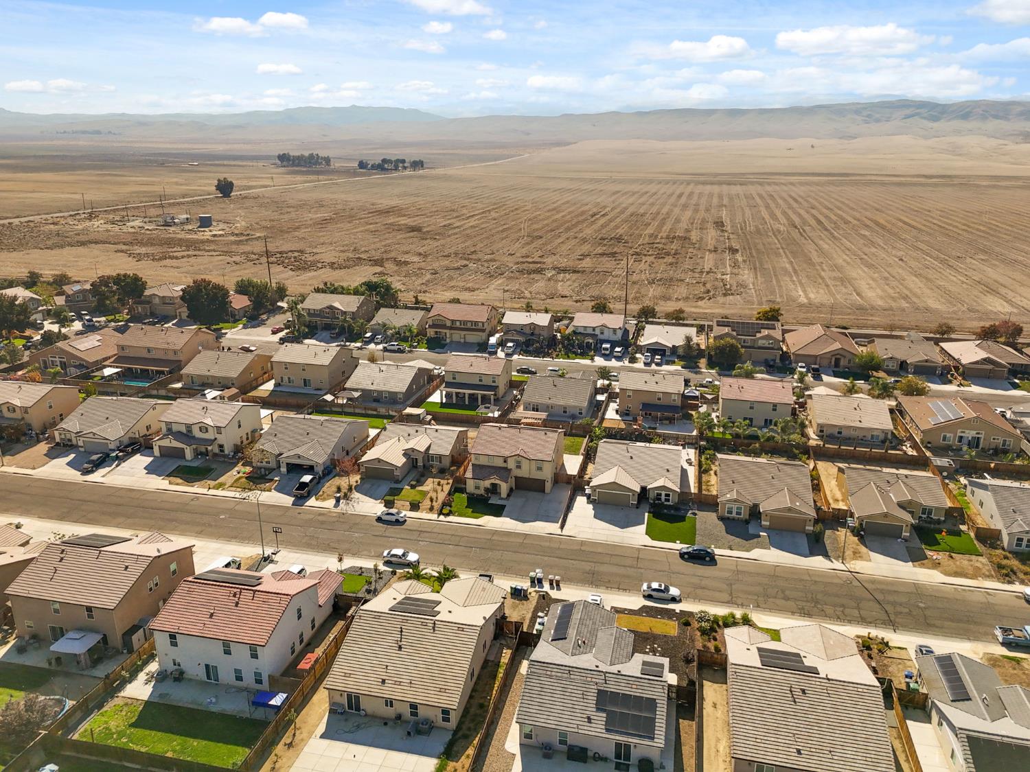 802 Riesling Lane Coalinga, CA 93210 - Photo 67 of 68 an aerial view of residential building and ocean