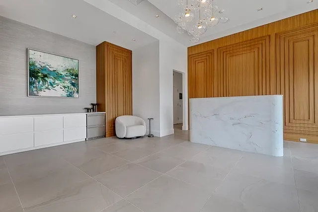a view of a livingroom with furniture and window
