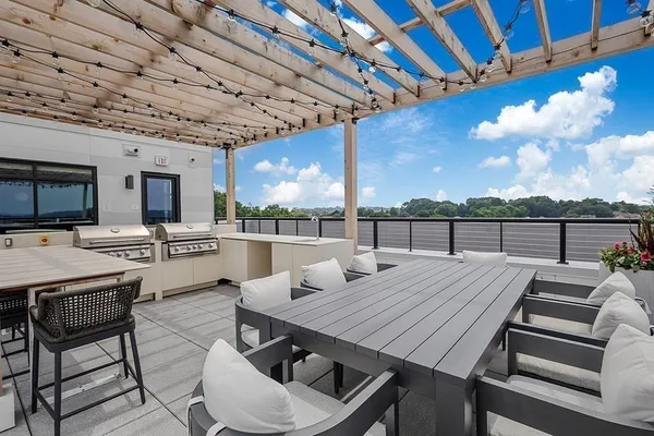 a outdoor space with lots of furniture and stove