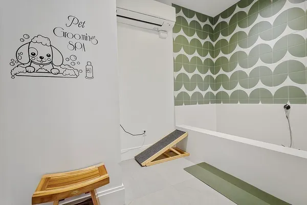 a view of a patio with table and chairs and potted plants