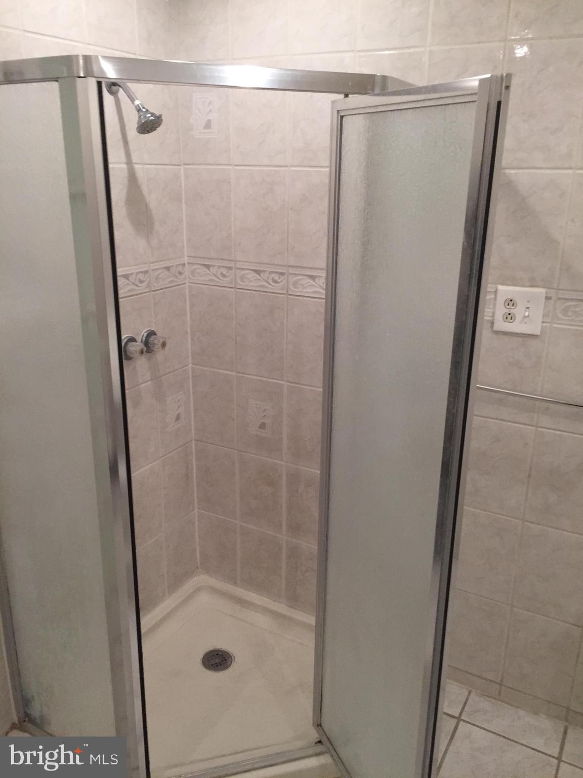 2618 Waterloo Street Philadelphia, PA 19133 - Photo 14 of 15 a bathroom with a shower