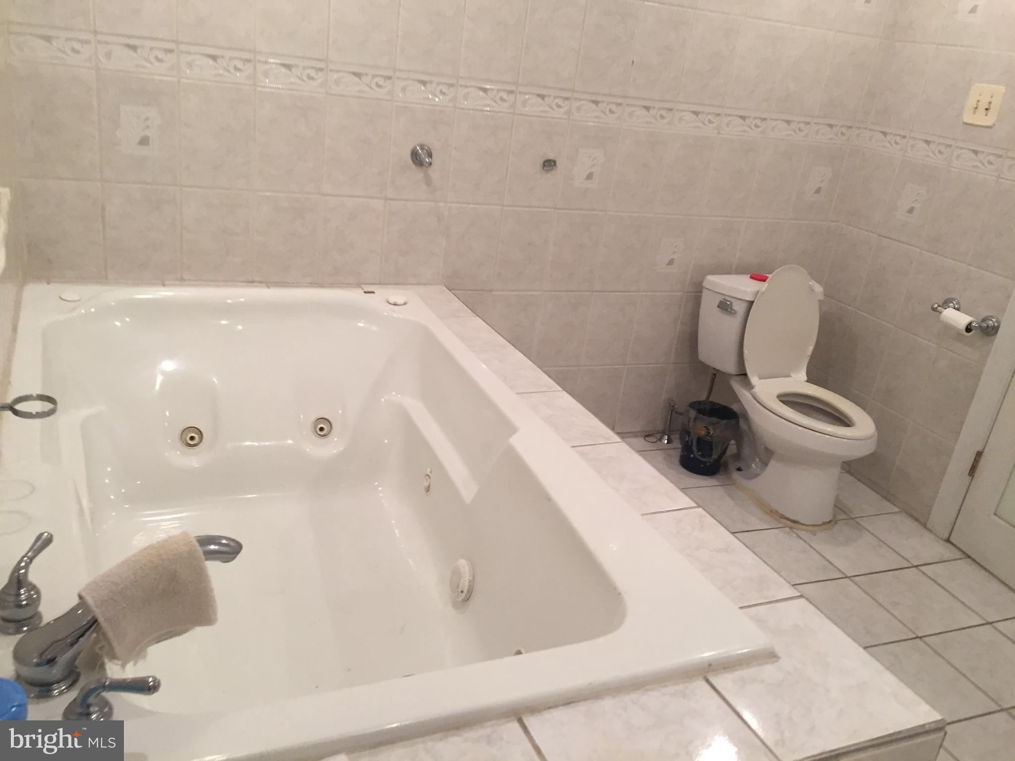 2618 Waterloo Street Philadelphia, PA 19133 - Photo 15 of 15 a bathroom with a sink and a toilet