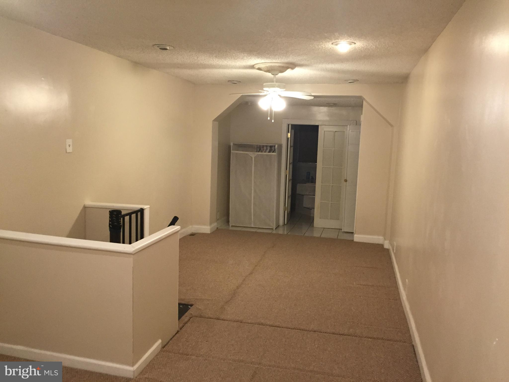 2618 Waterloo Street Philadelphia, PA 19133 - Photo 10 of 15 a view of a refrigerator in kitchen and utility room