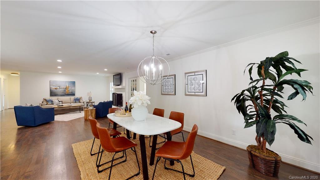 244 Scofield Road Charlotte, NC 28209 - Photo 11 of 30 a view of a dining room with furniture window and wooden floor