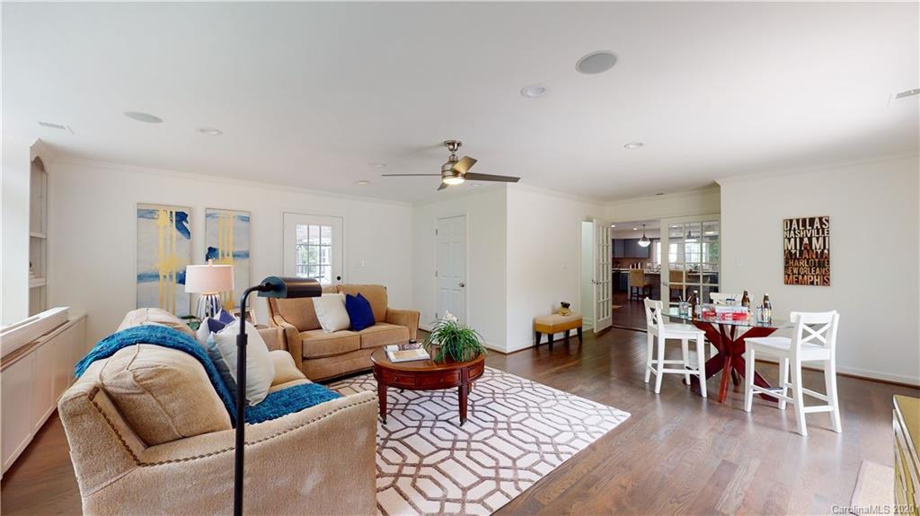 244 Scofield Road Charlotte, NC 28209 - Photo 18 of 30 a living room with furniture and wooden floor