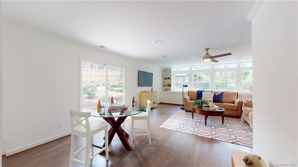 244 Scofield Road Charlotte, NC 28209 - Photo 20 of 30 a living room with furniture and a large window