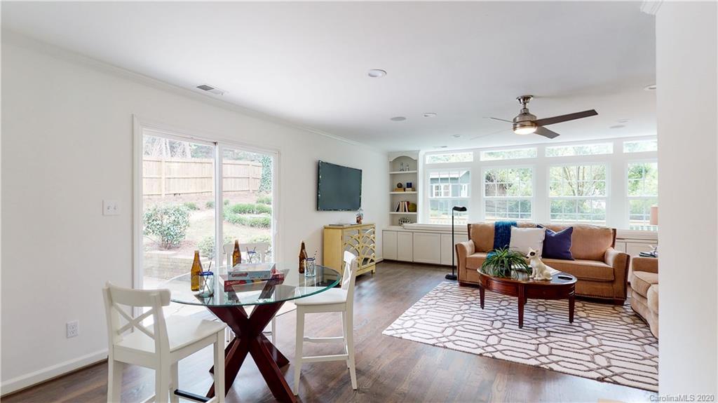 244 Scofield Road Charlotte, NC 28209 - Photo 21 of 30 a living room with furniture and a large window