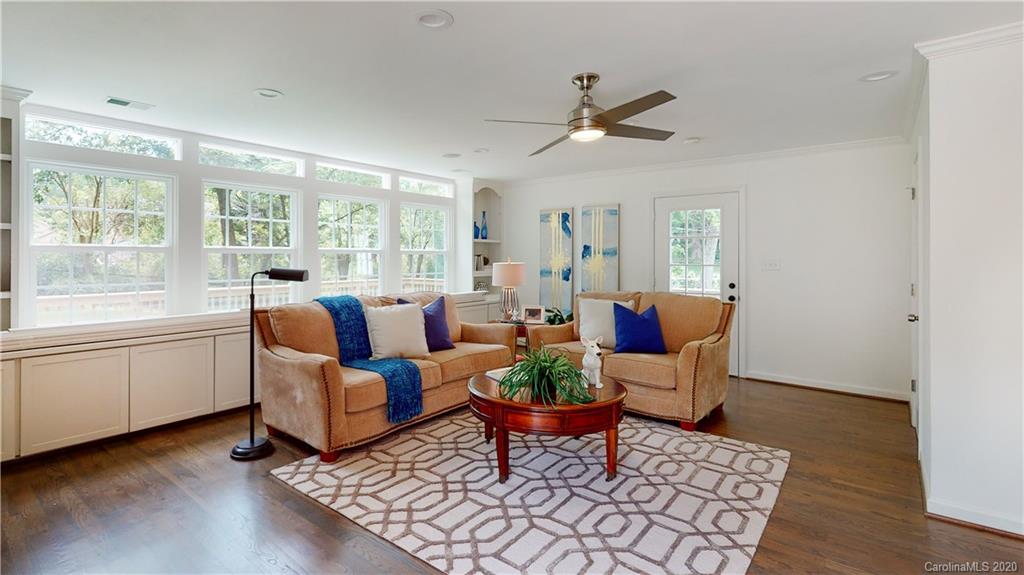 244 Scofield Road Charlotte, NC 28209 - Photo 22 of 30 a living room with furniture and a large window