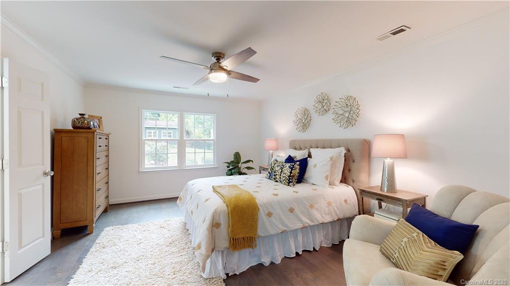 244 Scofield Road Charlotte, NC 28209 - Photo 25 of 30 a bedroom with bed and window