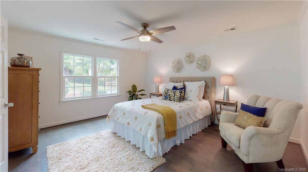 244 Scofield Road Charlotte, NC 28209 - Photo 27 of 30 a bedroom with bed and window