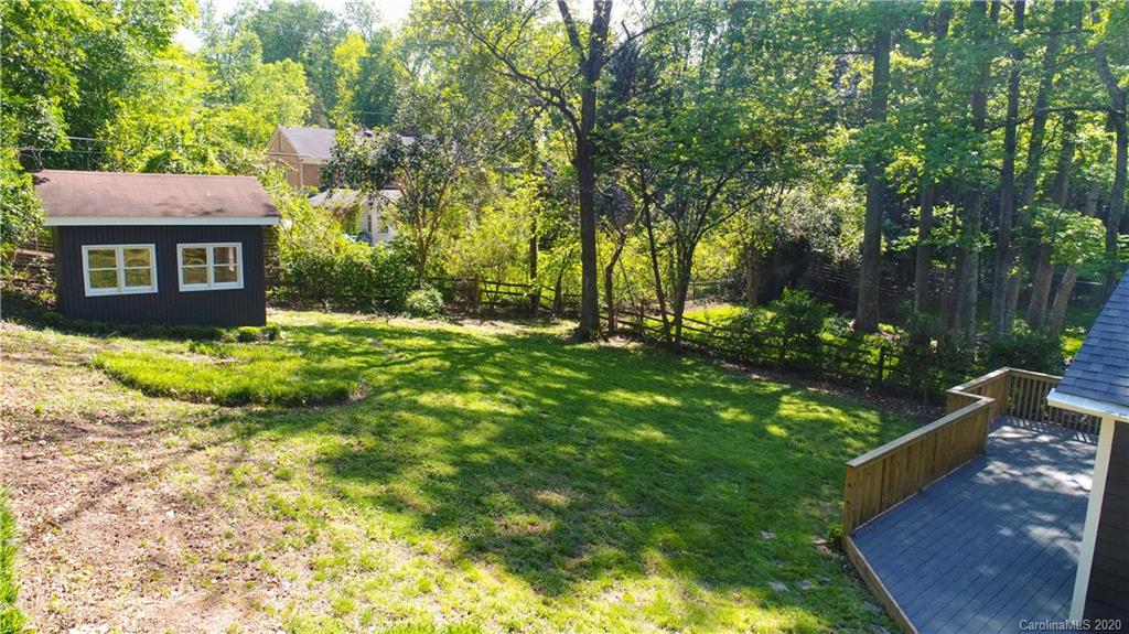 244 Scofield Road Charlotte, NC 28209 - Photo 30 of 30 a view of a house with a yard