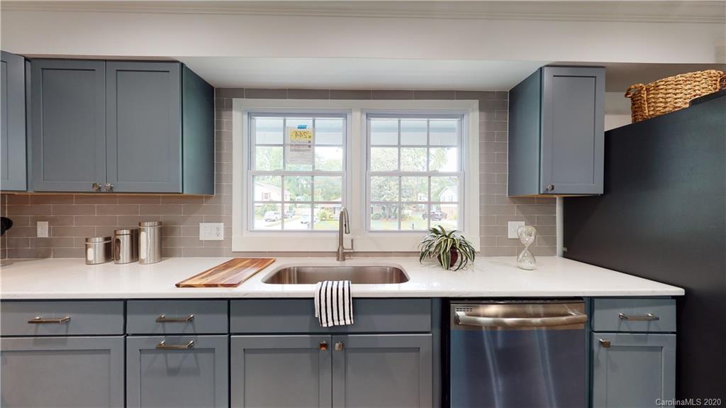 244 Scofield Road Charlotte, NC 28209 - Photo 8 of 30 a kitchen with a sink and cabinets