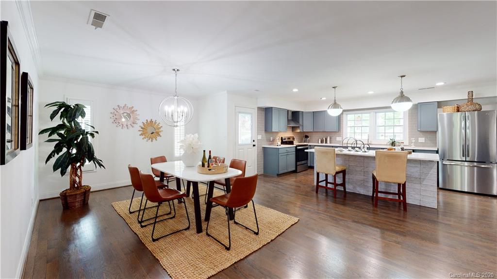 244 Scofield Road Charlotte, NC 28209 - Photo 9 of 30 a view of a dining room with furniture and wooden floor