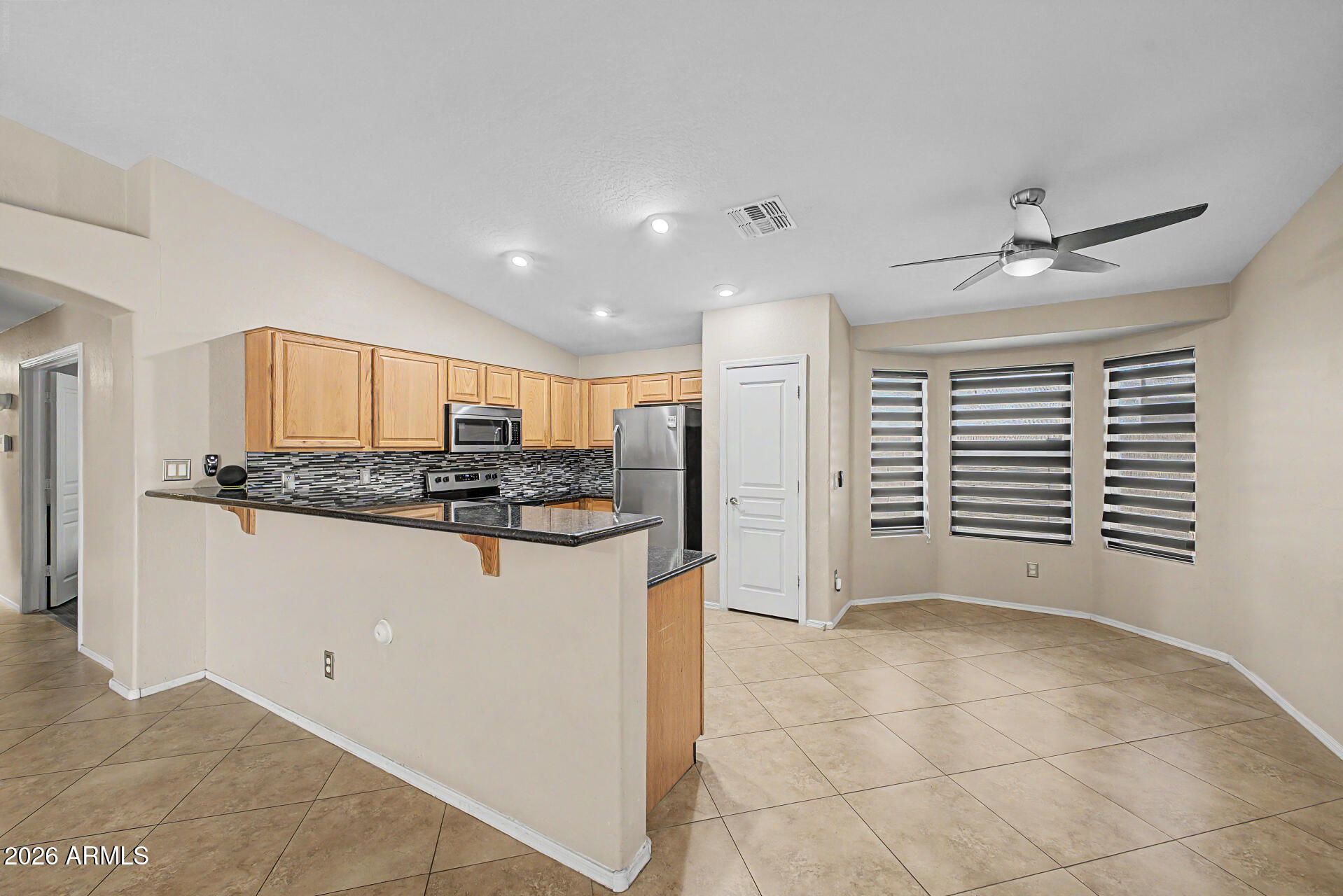 2340 West Apollo Road Phoenix, AZ 85041 - Photo 6 of 26 a view of a kitchen with a sink
