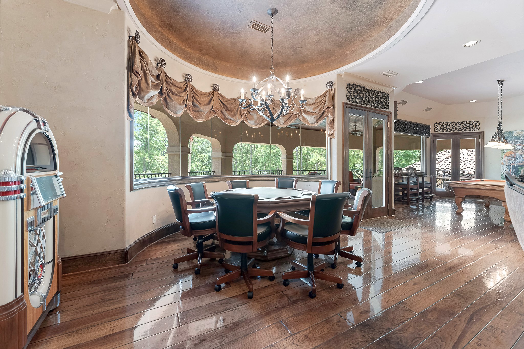 28322 Meadow Forest Magnolia, TX 77355 - Photo 25 of 50 Large Bay windows, frameless round bay windows provide southern exposure. Two dual exterior framed window doors lead out to a spacious private balcony area with views of the entire backyard and a spiral staircase for easy access to the backyard amenities.