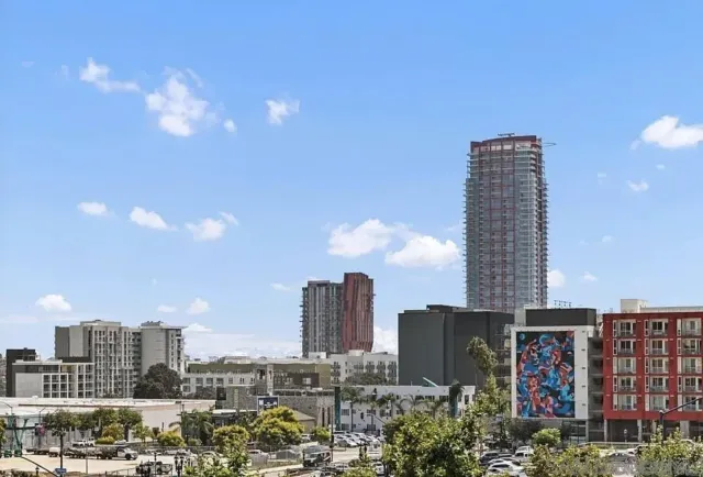 a view of a swimming pool with outdoor seating