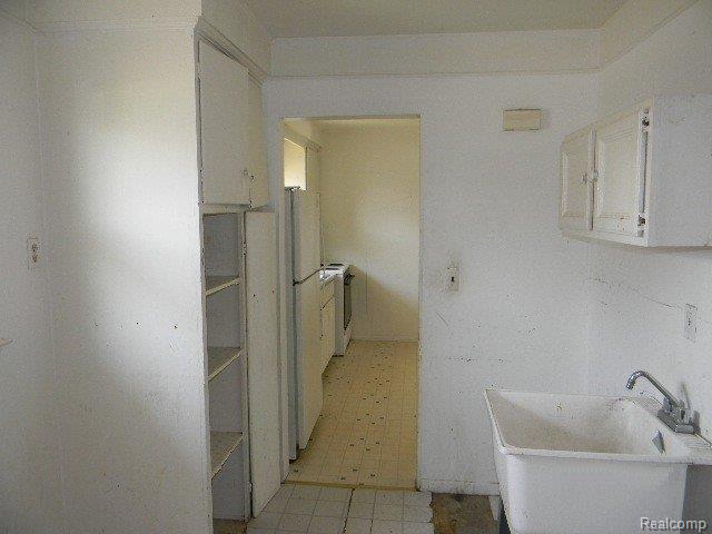 2425 Howe Street Utica, MI 48317 - Photo 11 of 21 261-904345 Laundry Room.JPG