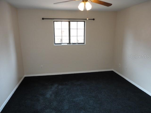 5841 Southwest 8th Place Gainesville, FL 32607 - Photo 13 of 15 an empty room with a window