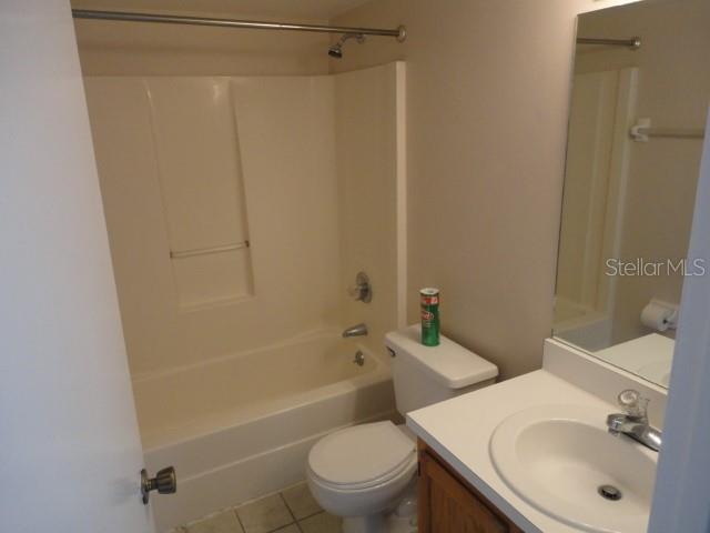 5841 Southwest 8th Place Gainesville, FL 32607 - Photo 9 of 15 a bathroom with a sink toilet and shower