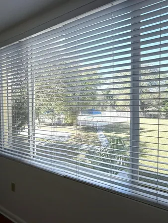 a view of a room that has a window