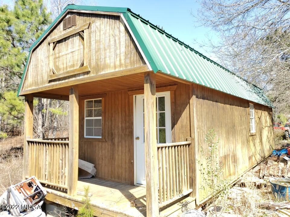 2755 Tribble Road Fort Valley, GA 31030 - Photo 6 of 10 a front view of a house with a yard