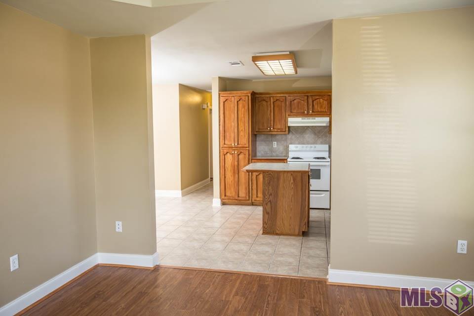 975 North 24th Street Baton Rouge, LA 70802 - Photo 2 of 10 KITCHEN VIEW FROM LIVINGROOM
