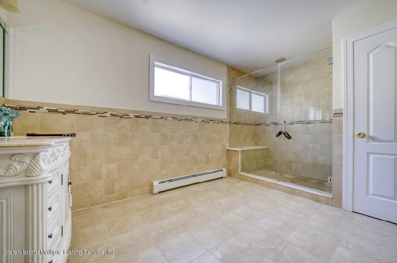 47 Brookside Loop Staten Island, NY 10309 - Photo 19 of 26 a bathroom with a shower