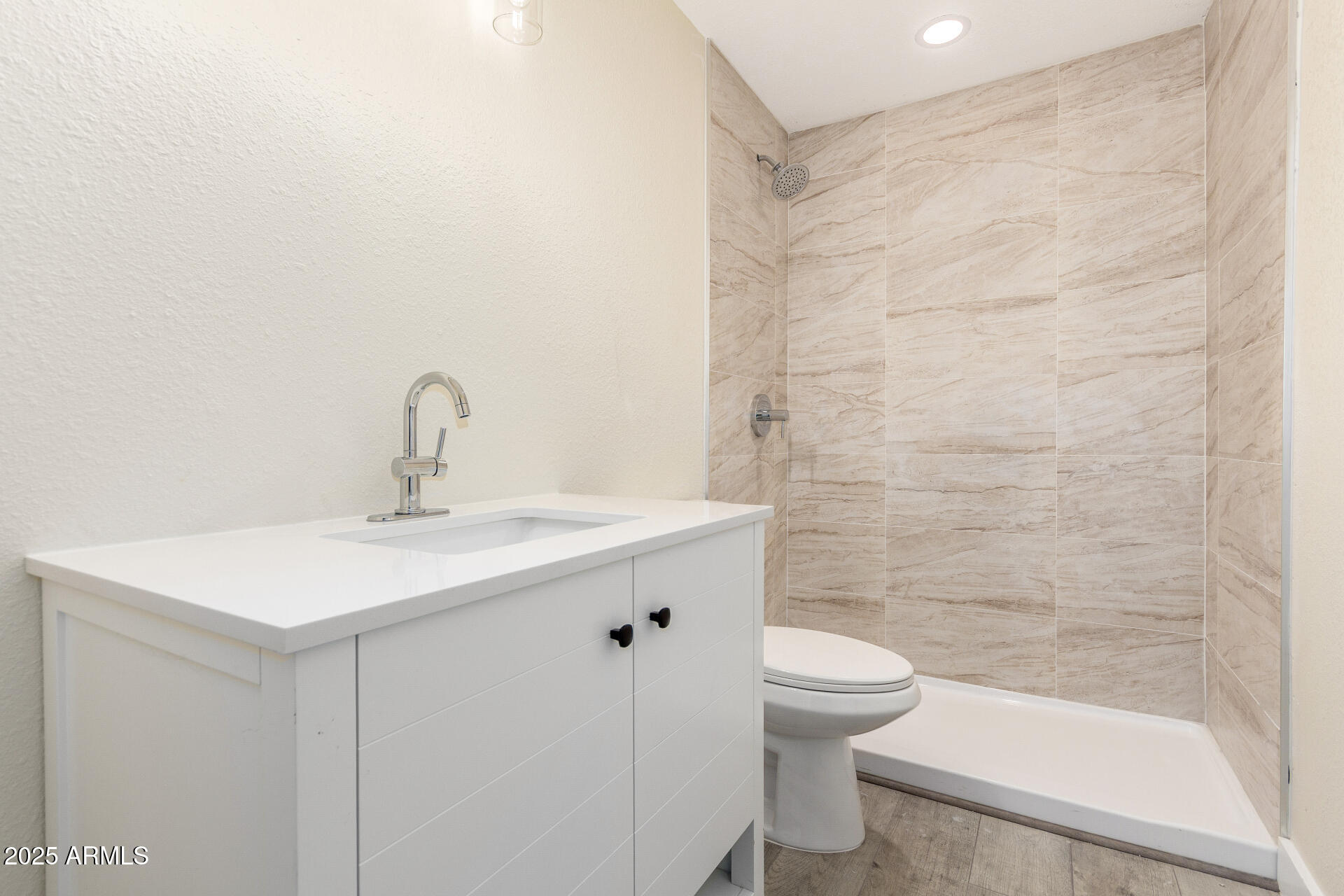 2749 West Montecito Avenue Phoenix, AZ 85017 - Photo 12 of 20 a bathroom with a sink a toilet and shower