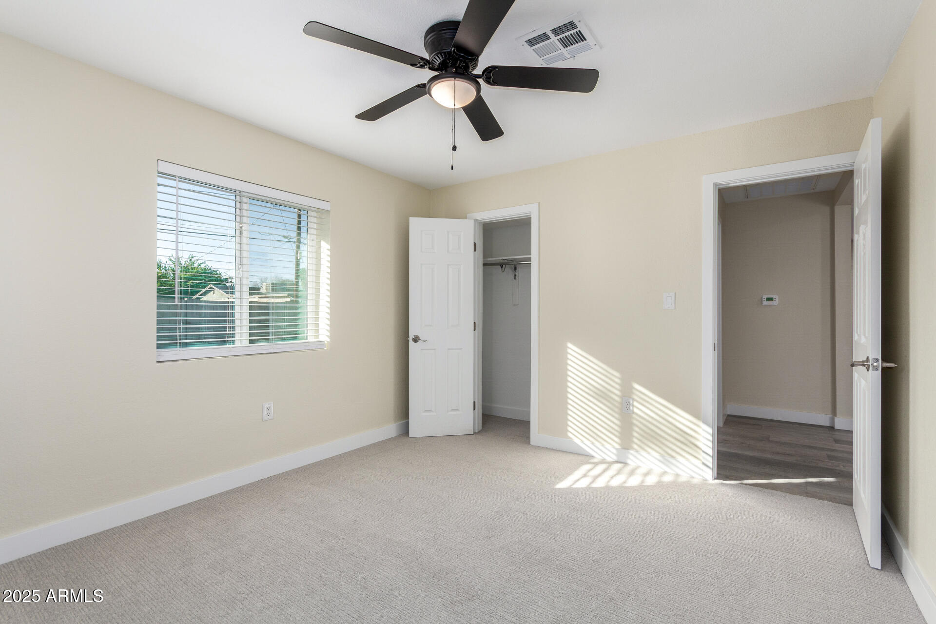 2749 West Montecito Avenue Phoenix, AZ 85017 - Photo 15 of 20 a view of an empty room with a window